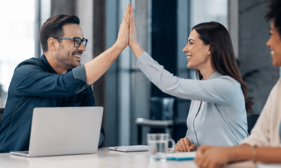 Sales and marketing teams collaborating to qualify leads and improve MQL-to-SQL conversion.
